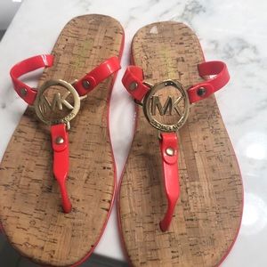 Michael Kors flip flops  orange/ coral size7 GC